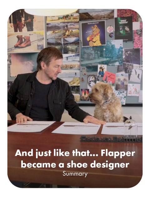Floris van Bommel is sitting at a desk with a small dog Flapper beside him, with a collage of shoe-related images on the wall behind them. Large white text at the bottom reads, 'And just like that.