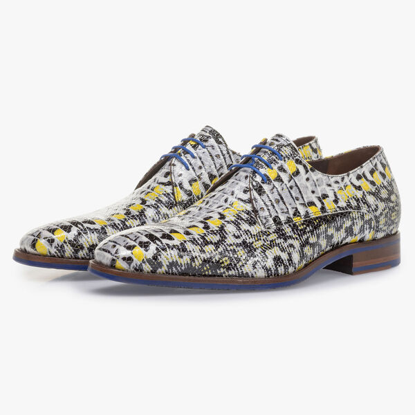 Yellow patent leather lace shoe with snake print
