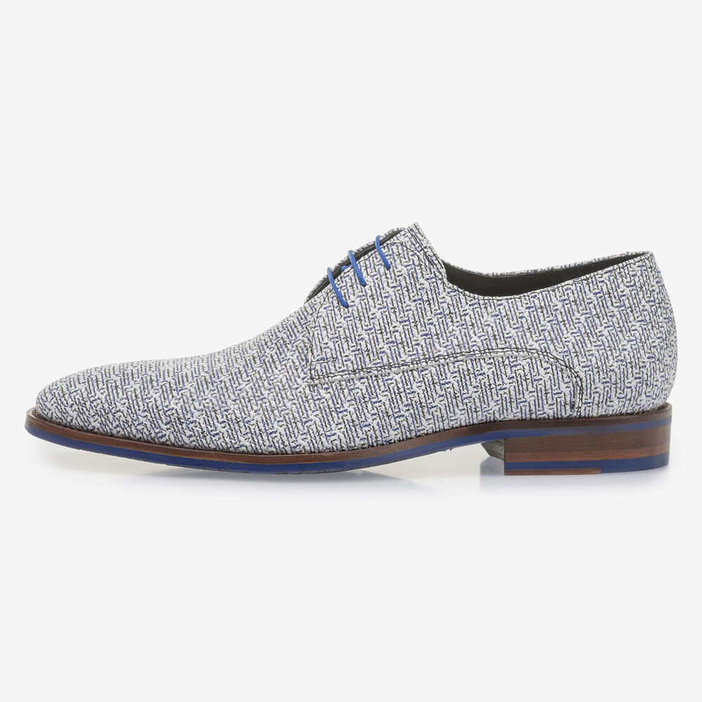 White leather lace shoe with blue print