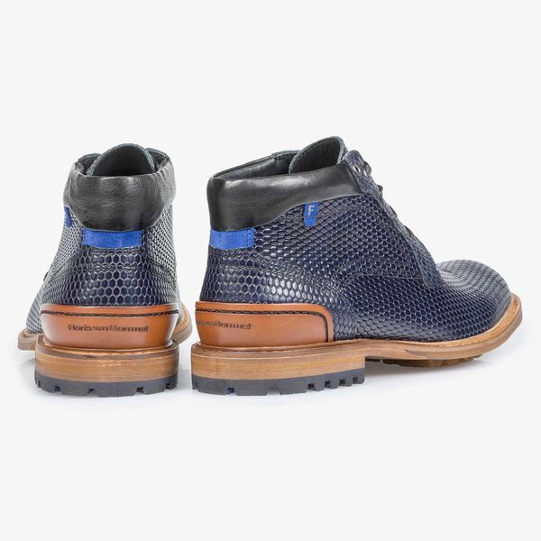Dark blue leather lace boot with a structural print