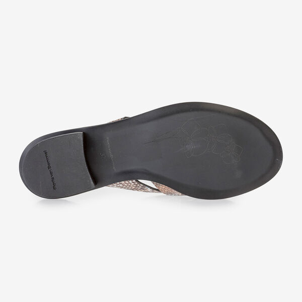 Brown and white leather slipper with snake print