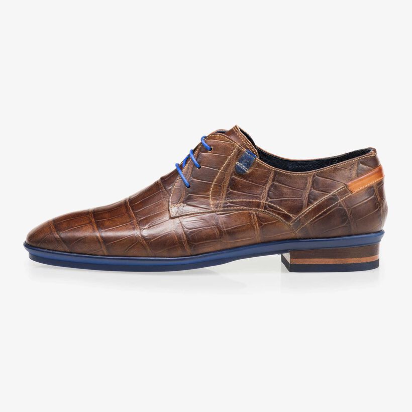 Brown leather lace shoe with a croco print