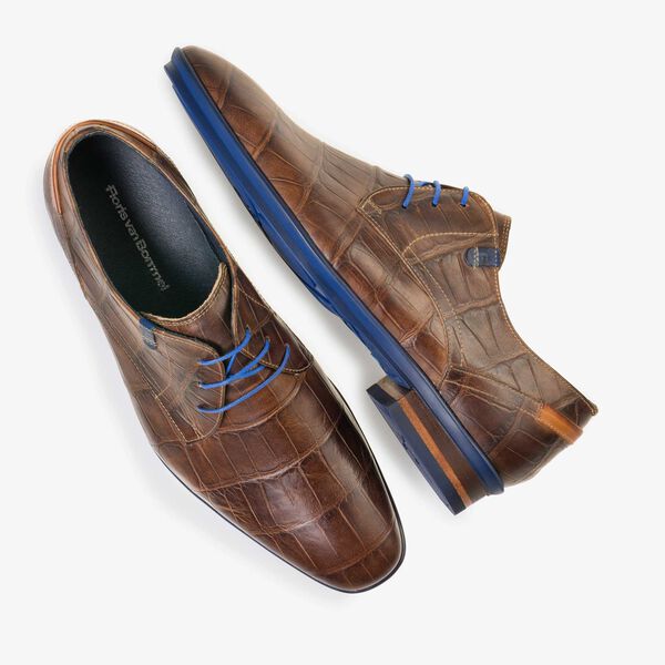 Brown leather lace shoe with a croco print