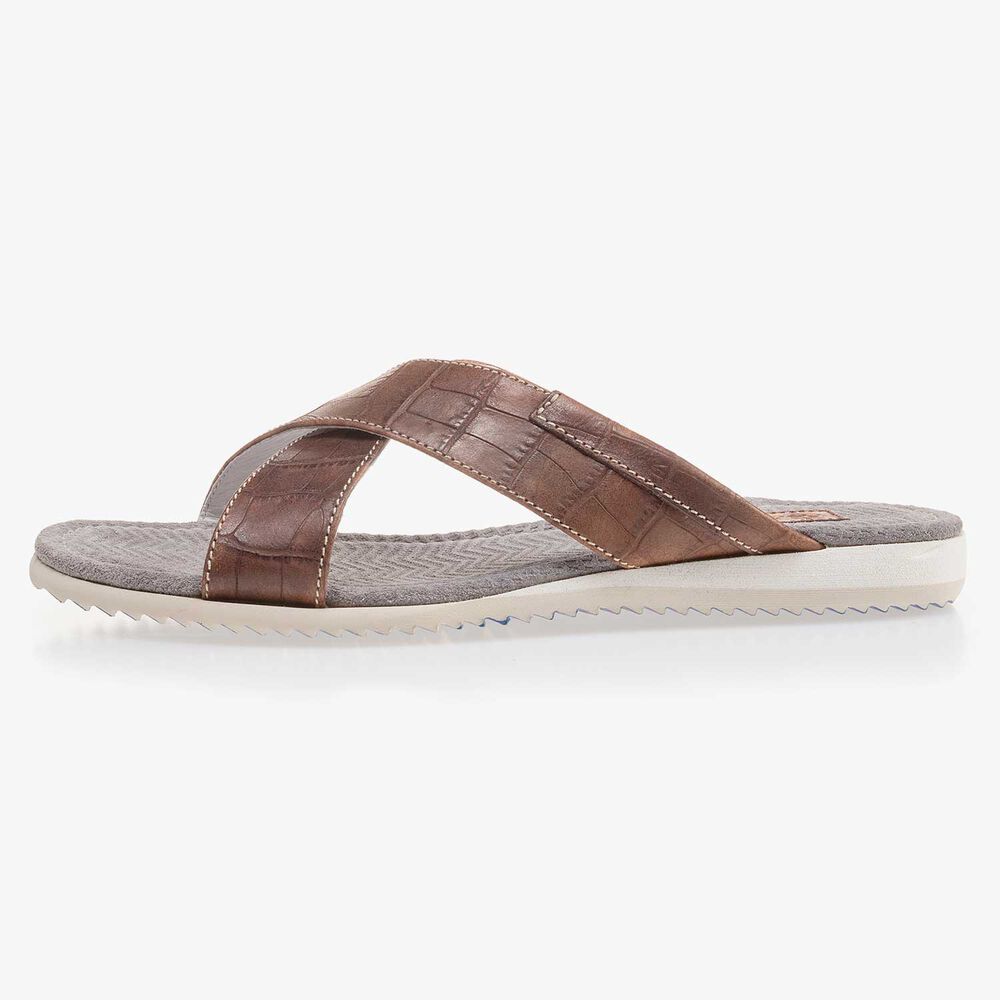 Cognacfarbener Lederslipper mit Kreuzriemen und Krokoprint