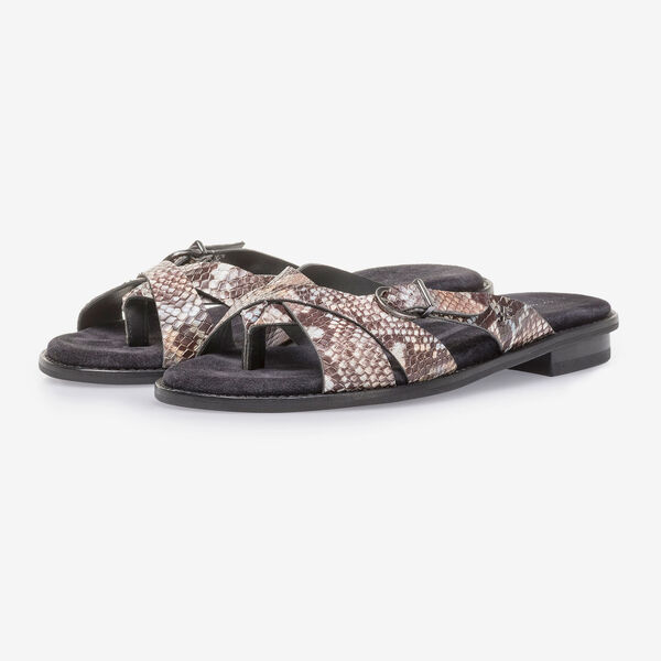 Brown and white leather slipper with snake print